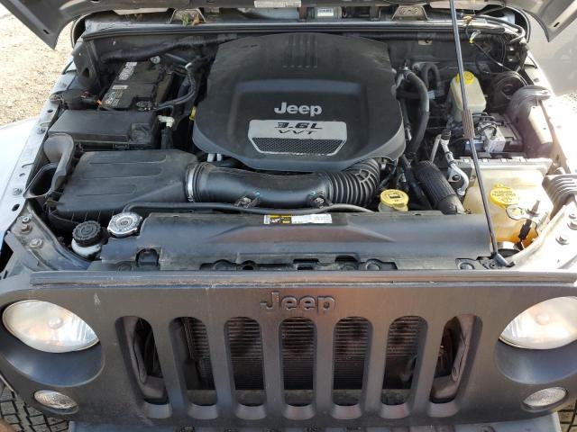 1C4HJWEG6DL625046 - 2013 JEEP WRANGLER U SAHARA SILVER photo 12
