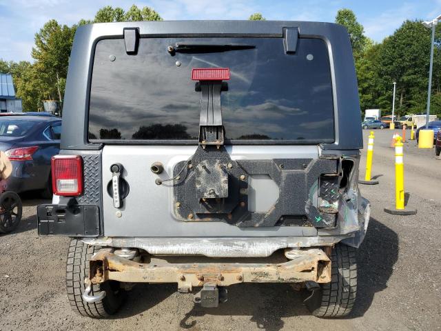 1C4HJWEG6DL625046 - 2013 JEEP WRANGLER U SAHARA SILVER photo 6