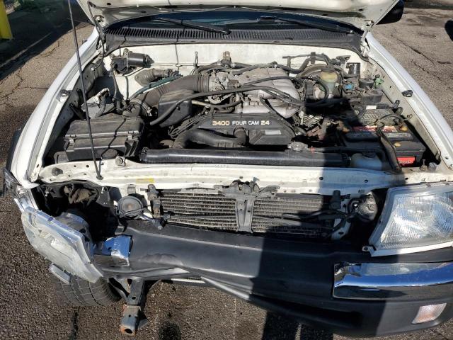 4TAWN72N7XZ409322 - 1999 TOYOTA TACOMA XTRACAB WHITE photo 11