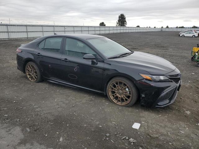 4T1T31AK6PU045890 - 2023 TOYOTA CAMRY SE NIGHT SHADE BLACK photo 4