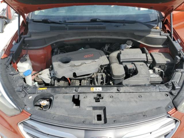 5XYZU3LB4HG383974 - 2017 HYUNDAI SANTA FE S Orange photo 12