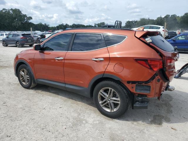 5XYZU3LB4HG383974 - 2017 HYUNDAI SANTA FE S Orange photo 2