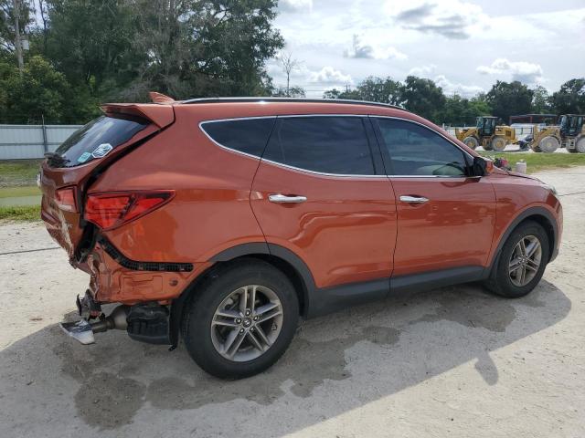5XYZU3LB4HG383974 - 2017 HYUNDAI SANTA FE S Orange photo 3