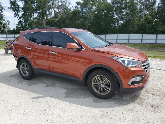 5XYZU3LB4HG383974 - 2017 HYUNDAI SANTA FE S Orange photo 4