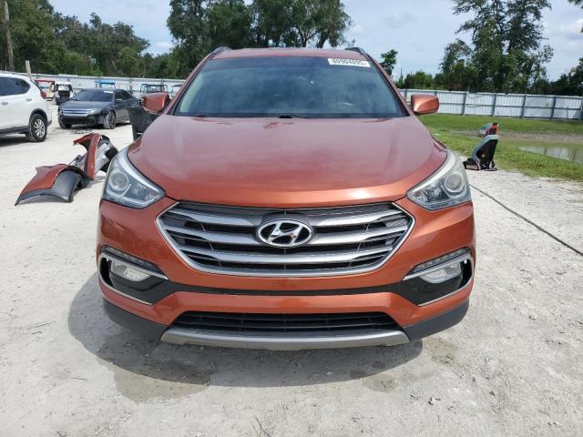 5XYZU3LB4HG383974 - 2017 HYUNDAI SANTA FE S Orange photo 5