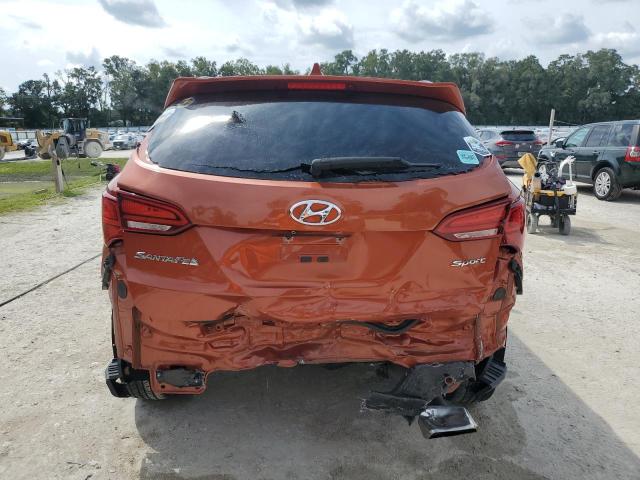 5XYZU3LB4HG383974 - 2017 HYUNDAI SANTA FE S Orange photo 6