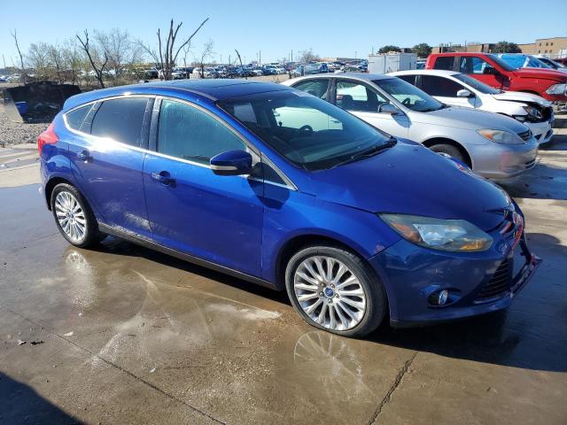 1FAHP3N25CL267234 - 2012 FORD FOCUS TITANIUM BLUE photo 4