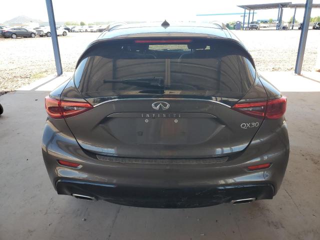 SJKCH5CP7JA044369 - 2018 INFINITI QX30 BASE TAN photo 6