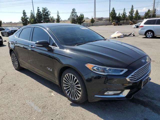 3FA6P0SU8HR329567 - 2017 FORD FUSION TITANIUM PHEV BLACK photo 4