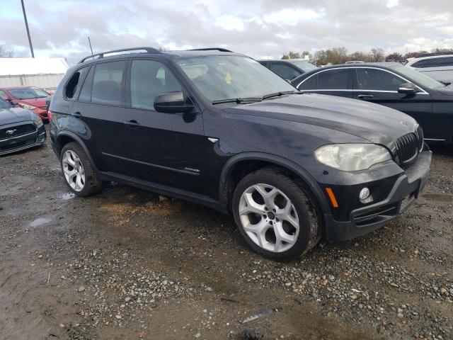 5UXFE8C55AL311942 - 2010 BMW X5 XDRIVE48I BLACK photo 4