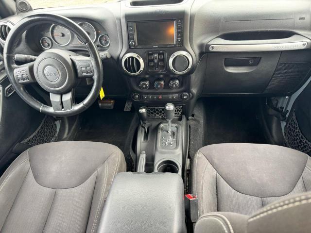 1C4BJWEG1EL304085 - 2014 JEEP WRANGLER U SAHARA GRAY photo 9