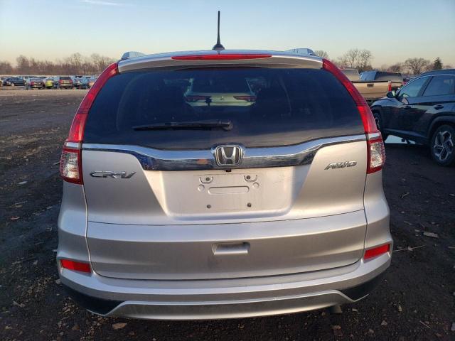 2HKRM4H74GH713940 - 2016 HONDA CR-V EXL SILVER photo 6