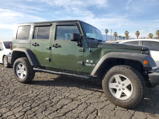 1J4GA39138L639499 - 2008 JEEP WRANGLER U X GREEN photo 4