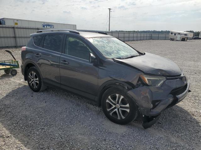 JTMZFREV1HJ128610 - 2017 TOYOTA RAV4 LE CHARCOAL photo 4