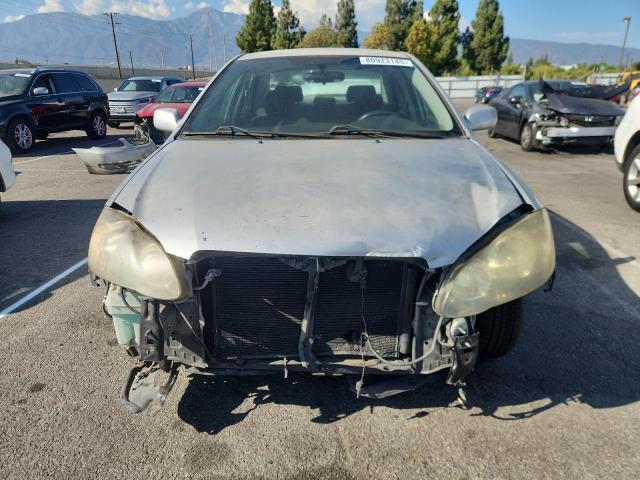 1NXBR30E36Z646254 - 2006 TOYT COROLLA CE Silber Foto 5