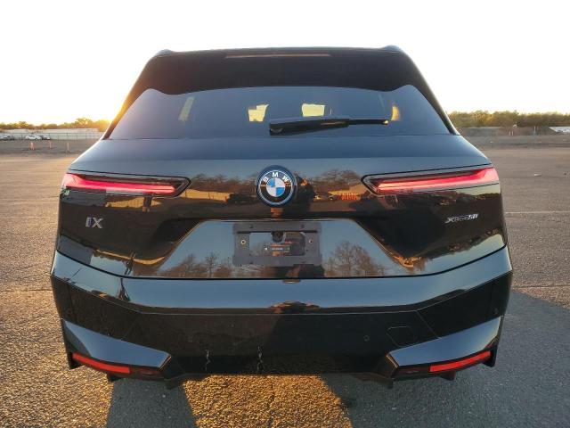 WB523CF06SCS98463 - 2025 BMW IX XDRIVE50 BLACK photo 6