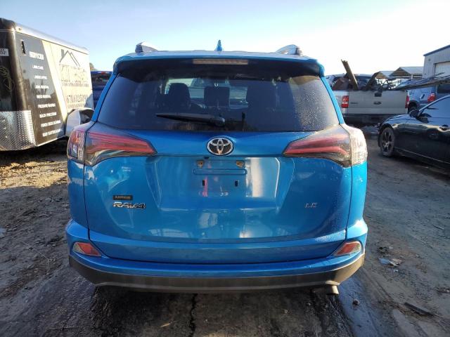 2T3ZFREV9GW261583 - 2016 TOYOTA RAV4 LE BLUE photo 6