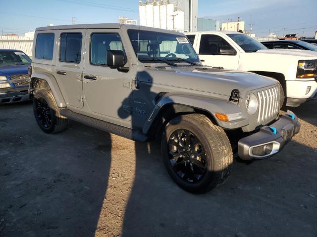 1C4JJXP67NW232216 - 2022 JEEP WRANGLER U SAHARA 4XE GRAY photo 4