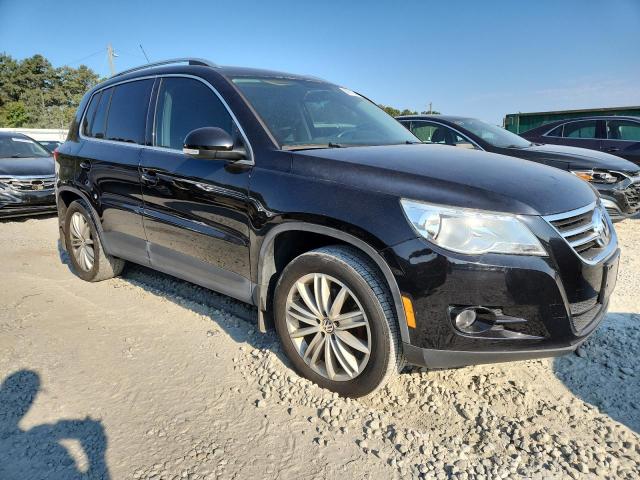 WVGBV7AX9BW532468 - 2011 VOLKSWAGEN TIGUAN S BLACK photo 4