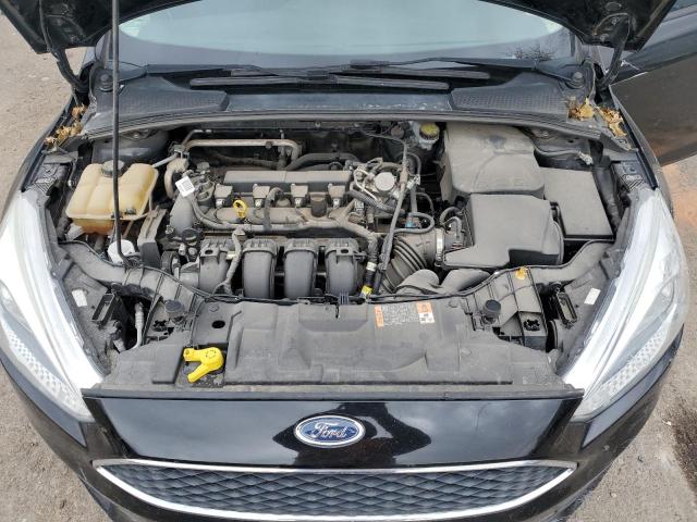 1FADP3F24GL400763 - 2016 FORD FOCUS SE BLACK photo 11