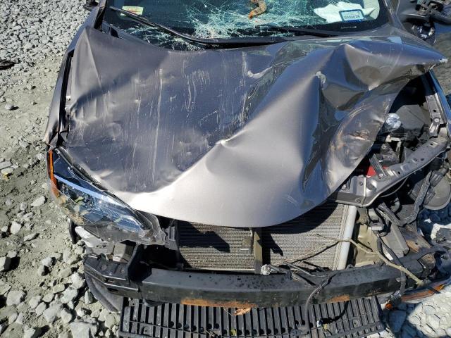 5YFBURHE1JP826591 - 2018 TOYOTA COROLLA L 棕色 照片 11