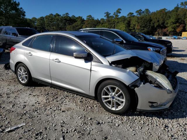 1FADP3F22FL207462 - 2015 FORD FOCUS SE SILVER photo 4