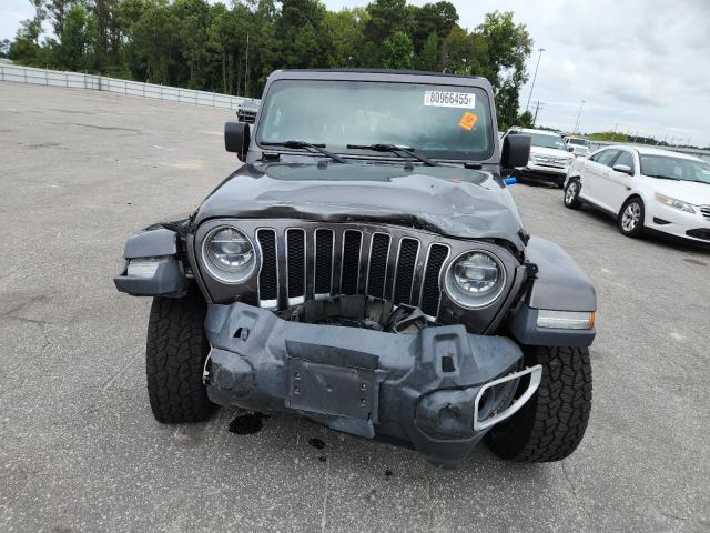 1C4HJXEN1JW283715 - 2018 JEEP WRANGLER U SAHARA Grau Foto 5