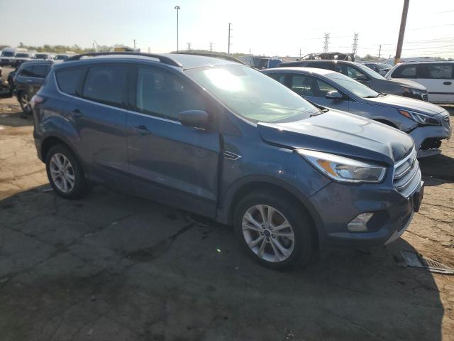 1FMCU9GD5JUA87219 - 2018 FORD ESCAPE SE Blau Foto 4