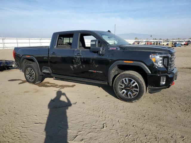 1GT49PEY9PF255302 - 2023 GMC SIERRA K2500 AT4 BLACK photo 4