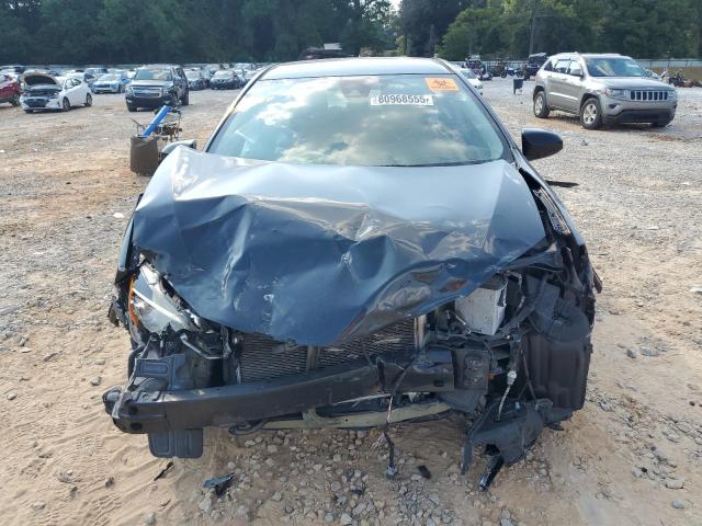 5YFBURHE0KP940860 - 2019 TOYOTA COROLLA L BLACK photo 5