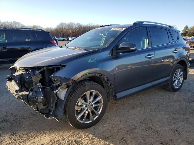 2T3YFREV3JW459207 - 2018 TOYOTA RAV4 LIMITED SILVER photo 1