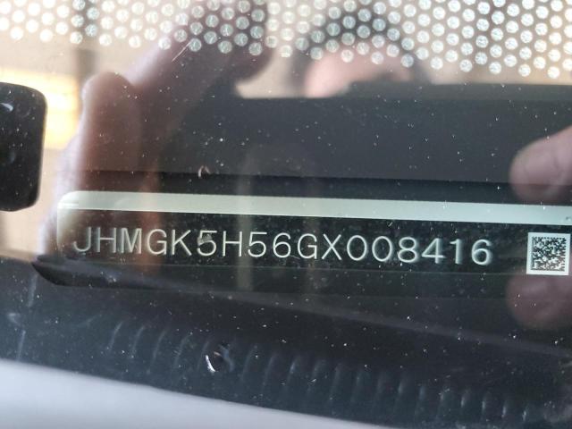 JHMGK5H56GX008416 - 2016 HONDA FIT LX WHITE photo 12