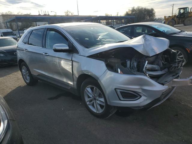 2FMPK4J97GBC14257 - 2016 FORD EDGE SEL SILVER photo 4