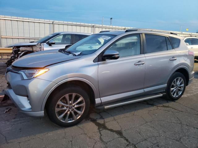 2T3DFREV6JW807953 - 2018 TOYOTA RAV4 LIMITED SILVER photo 1