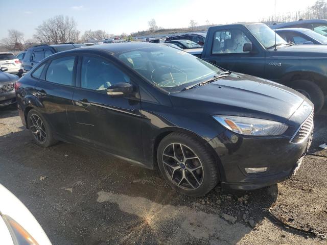 1FADP3FE6FL348755 - 2015 FORD FOCUS SE BLACK photo 4