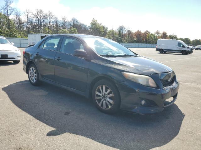2T1BU4EE7AC435064 - 2010 TOYOTA COROLLA BASE BLACK photo 4