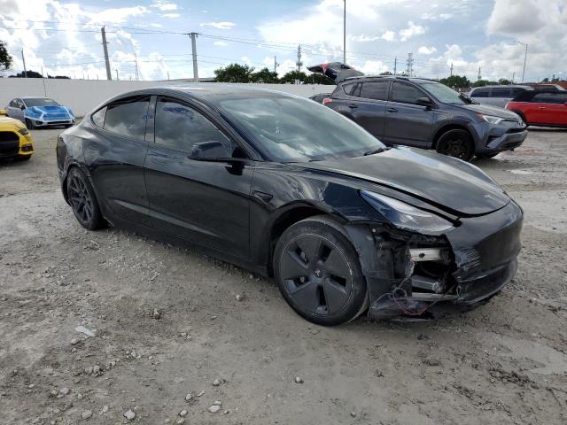 5YJ3E1EAXPF452605 - 2023 TESLA MODEL 3 BLACK photo 4