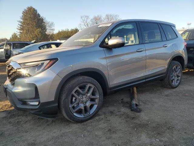 5FNYF8H55PB022958 - 2023 HONDA PASSPORT EXL SILVER photo 1