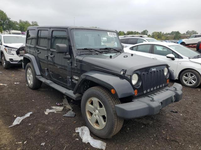 1J4BA5H14BL573463 - 2011 JEEP WRANGLER U SAHARA შავი ფოტო 4