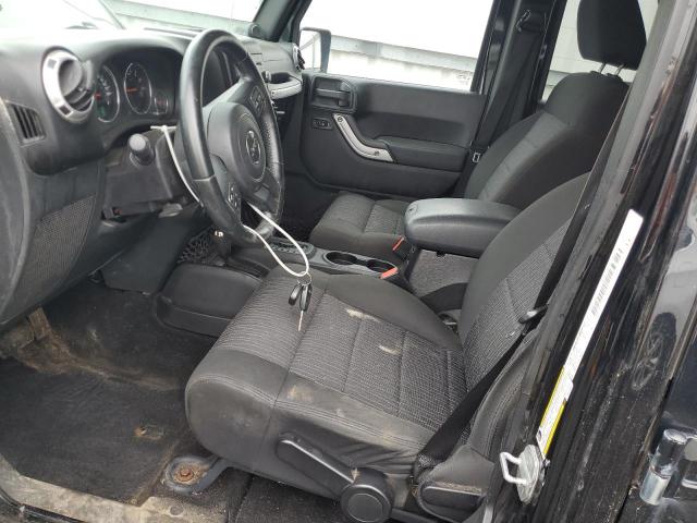 1J4BA5H14BL573463 - 2011 JEEP WRANGLER U SAHARA შავი ფოტო 7