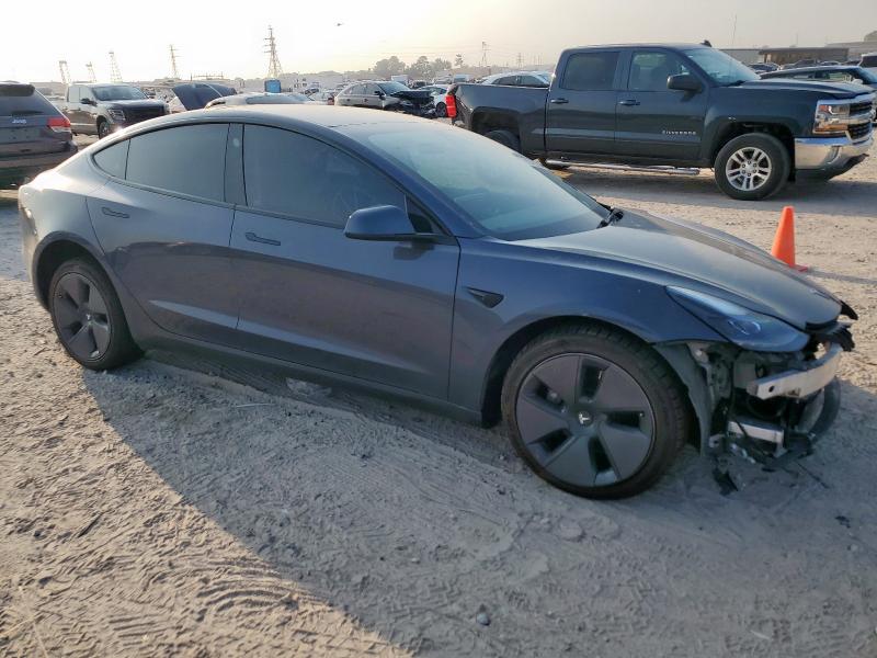 5YJ3E1EA4PF641198 - 2023 TESLA MODEL 3 Серый фото 4