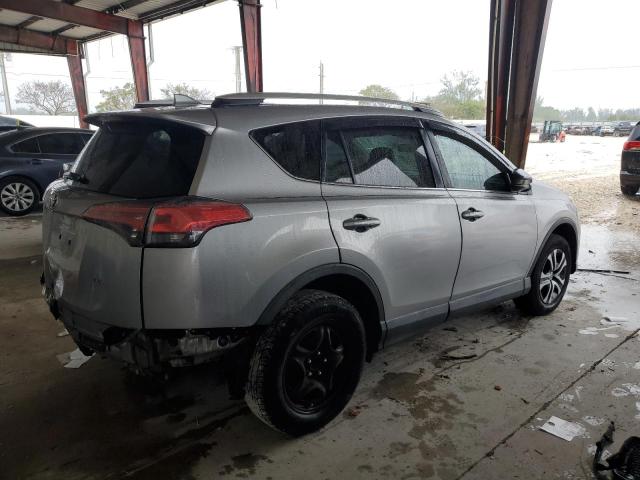 2T3ZFREV1GW311148 - 2016 TOYOTA RAV4 LE SILVER photo 3