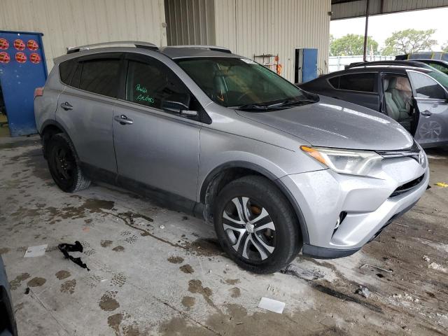 2T3ZFREV1GW311148 - 2016 TOYOTA RAV4 LE SILVER photo 4