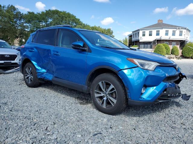 JTMRFREV7HJ129986 - 2017 TOYOTA RAV4 XLE ლურჯი ფოტო 4