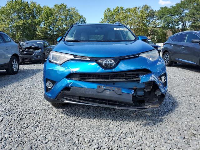 JTMRFREV7HJ129986 - 2017 TOYOTA RAV4 XLE ლურჯი ფოტო 5