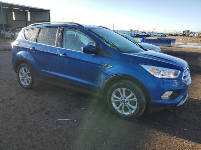 1FMCU9G98HUB90687 - 2017 FORD ESCAPE SE BLUE photo 4