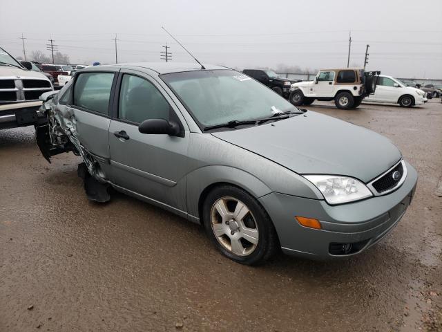 1FAFP34N05W236087 - 2005 FORD FOCUS ZX4 TEAL photo 4