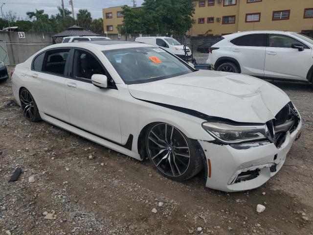 WBA7F0C51GGL99309 - 2016 BMW 750 I WHITE photo 4