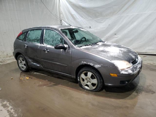 1FAFP37N86W216358 - 2006 FORD FOCUS ZX5 GRAY photo 4