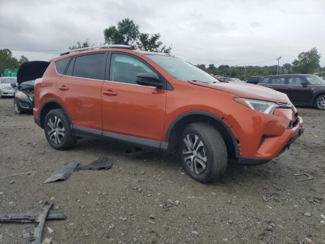 2T3BFREV3GW414962 - 2016 TOYOTA RAV4 LE ORANGE photo 4